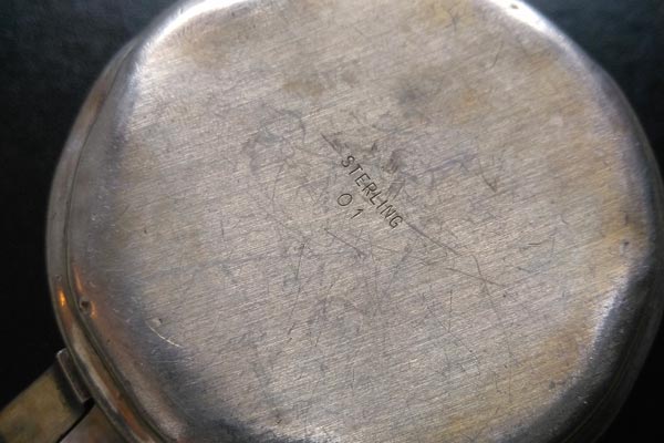 Markings that indicate sterling silver tableware